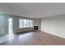 100 Sirius Avenue, Fort Mcmurray, AB  - Indoor Photo Showing Living Room With Fireplace 