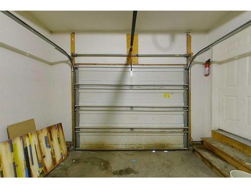 100 Sirius Avenue, Fort Mcmurray, AB - Indoor Photo Showing Garage