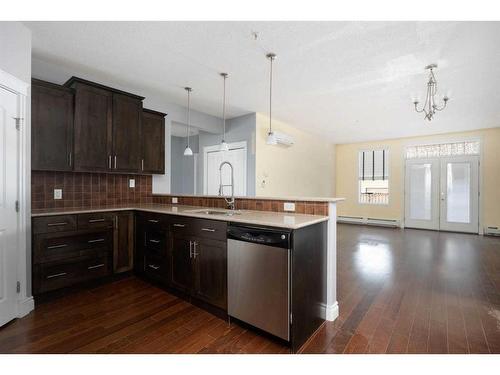 103-9919 Gordon Avenue, Fort Mcmurray, AB - Indoor Photo Showing Kitchen With Upgraded Kitchen