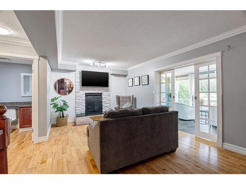 121 Burns Place, Fort Mcmurray, AB - Indoor Photo Showing Living Room With Fireplace