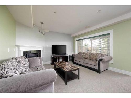 145 Fireweed Crescent, Fort Mcmurray, AB - Indoor Photo Showing Living Room With Fireplace