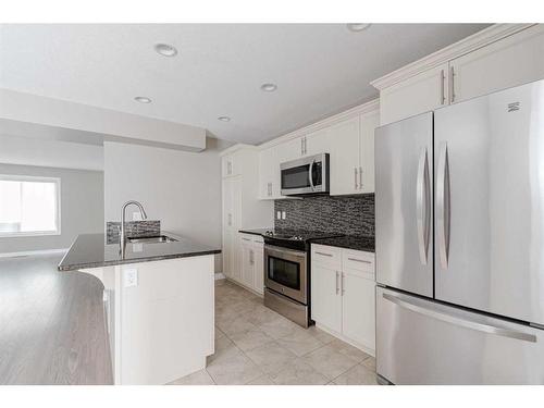 149 Callen Drive, Fort Mcmurray, AB - Indoor Photo Showing Kitchen With Stainless Steel Kitchen With Upgraded Kitchen