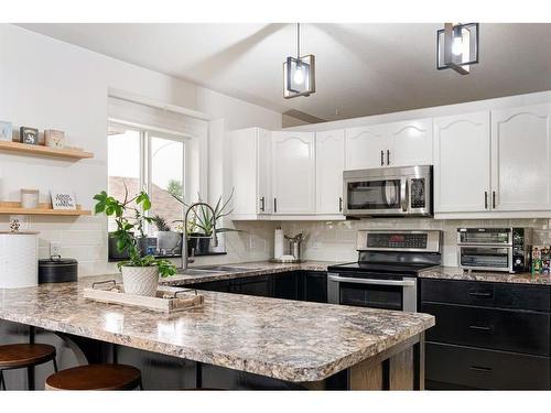 197 Waniandy Way, Fort Mcmurray, AB - Indoor Photo Showing Kitchen With Upgraded Kitchen