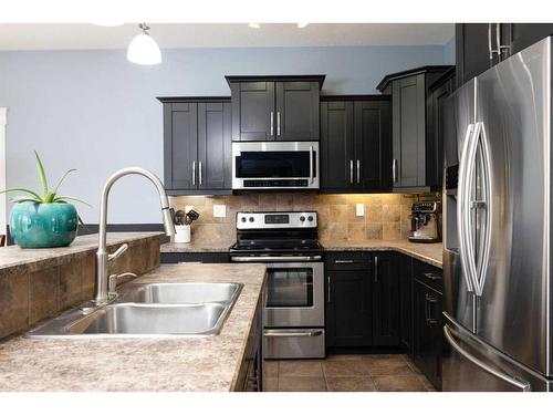 164 Heron Place, Fort Mcmurray, AB - Indoor Photo Showing Kitchen With Stainless Steel Kitchen With Double Sink With Upgraded Kitchen