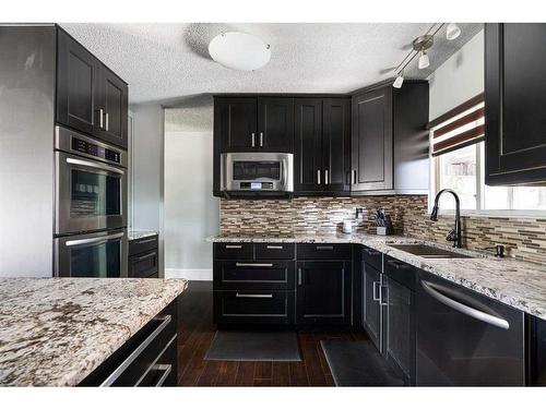 1 May Crescent, Fort Mcmurray, AB - Indoor Photo Showing Kitchen With Upgraded Kitchen