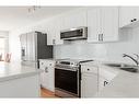 140 Archibald Close, Fort Mcmurray, AB  - Indoor Photo Showing Kitchen With Double Sink With Upgraded Kitchen 