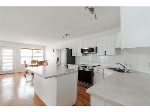 140 Archibald Close, Fort Mcmurray, AB - Indoor Photo Showing Kitchen With Double Sink