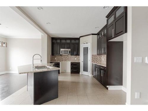 159 Heron Place, Fort Mcmurray, AB - Indoor Photo Showing Kitchen With Double Sink With Upgraded Kitchen