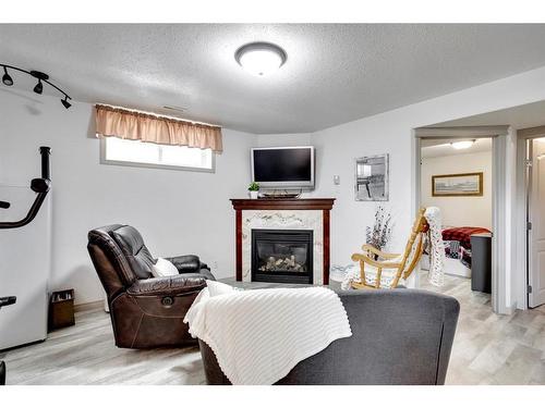 156 Archibald Close, Fort Mcmurray, AB - Indoor Photo Showing Other Room With Fireplace