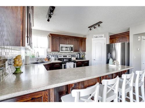 156 Archibald Close, Fort Mcmurray, AB - Indoor Photo Showing Kitchen With Double Sink