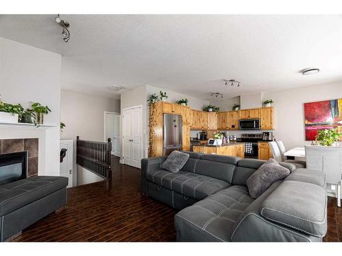 185 Blue Jay Road, Fort Mcmurray, AB - Indoor Photo Showing Living Room With Fireplace