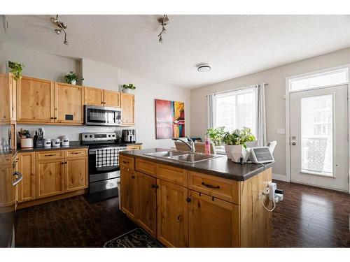 185 Blue Jay Road, Fort Mcmurray, AB - Indoor Photo Showing Kitchen With Double Sink