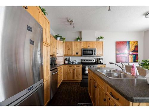 185 Blue Jay Road, Fort Mcmurray, AB - Indoor Photo Showing Kitchen With Double Sink