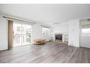 8-220 Swanson Crescent, Fort Mcmurray, AB  - Indoor Photo Showing Living Room With Fireplace 