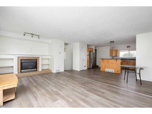 8-220 Swanson Crescent, Fort Mcmurray, AB - Indoor Photo Showing Living Room With Fireplace