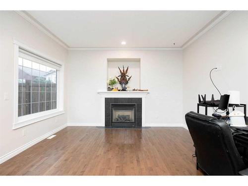 247 Pacific Crescent, Fort Mcmurray, AB - Indoor Photo Showing Living Room With Fireplace