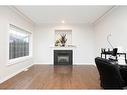 247 Pacific Crescent, Fort Mcmurray, AB  - Indoor Photo Showing Living Room With Fireplace 