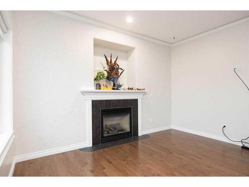 247 Pacific Crescent, Fort Mcmurray, AB - Indoor Photo Showing Living Room With Fireplace