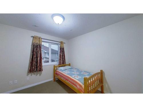 2-248C Grosbeak Way, Fort Mcmurray, AB - Indoor Photo Showing Bedroom