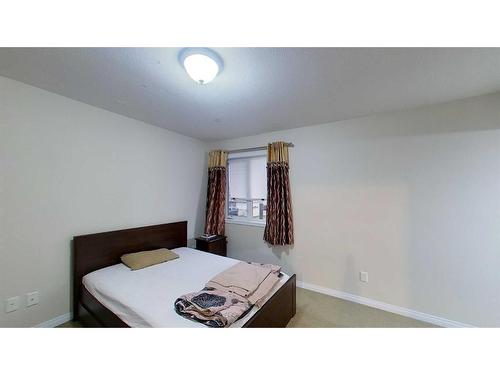 2-248C Grosbeak Way, Fort Mcmurray, AB - Indoor Photo Showing Bedroom