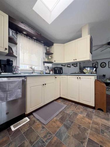 252 Belgian Green, Fort Mcmurray, AB - Indoor Photo Showing Kitchen With Double Sink