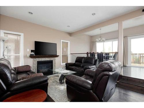 149 Pintail Place, Fort Mcmurray, AB - Indoor Photo Showing Living Room With Fireplace