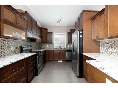 149 Pintail Place, Fort Mcmurray, AB - Indoor Photo Showing Kitchen With Upgraded Kitchen