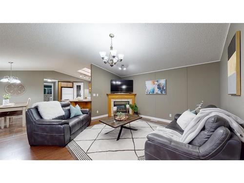 369 Ash Way, Fort Mcmurray, AB - Indoor Photo Showing Living Room With Fireplace