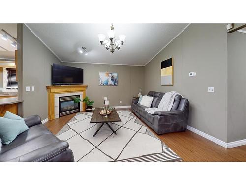 369 Ash Way, Fort Mcmurray, AB - Indoor Photo Showing Living Room With Fireplace