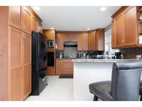 113 Sparrow Hawk Drive, Fort Mcmurray, AB - Indoor Photo Showing Kitchen