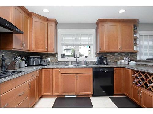 113 Sparrow Hawk Drive, Fort Mcmurray, AB - Indoor Photo Showing Kitchen With Double Sink