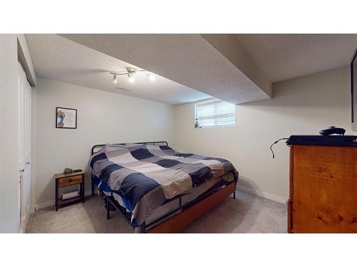 128 Tundra Drive, Fort Mcmurray, AB - Indoor Photo Showing Bedroom