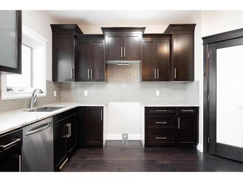 221 Stonecreek Landing, Fort Mcmurray, AB - Indoor Photo Showing Kitchen With Double Sink