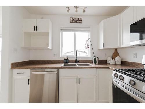 201 St. Laurent Way, Fort Mcmurray, AB - Indoor Photo Showing Kitchen With Double Sink