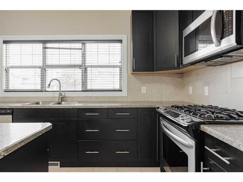 106 Merganser Crescent, Fort Mcmurray, AB - Indoor Photo Showing Kitchen With Upgraded Kitchen