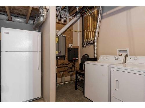 106 Merganser Crescent, Fort Mcmurray, AB - Indoor Photo Showing Laundry Room