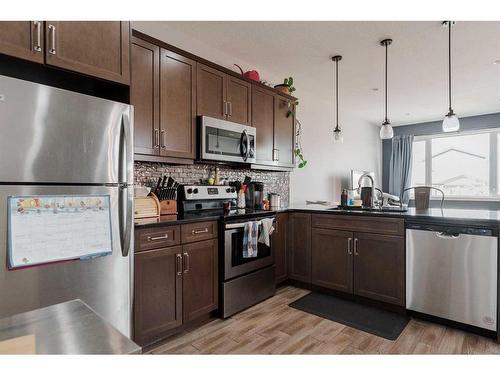 109 Roy Lane, Fort Mcmurray, AB - Indoor Photo Showing Kitchen With Upgraded Kitchen