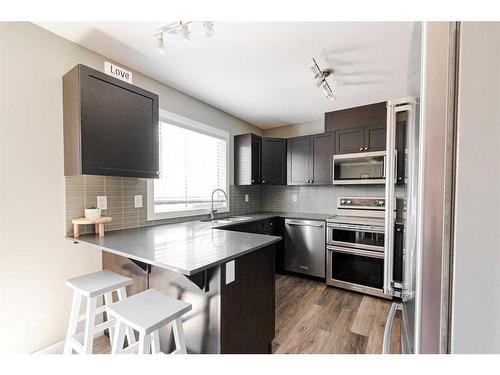 165-401 Athabasca Avenue, Fort Mcmurray, AB - Indoor Photo Showing Kitchen With Stainless Steel Kitchen