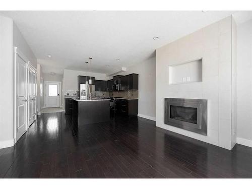 152 Collicott Drive, Fort Mcmurray, AB - Indoor Photo Showing Living Room With Fireplace