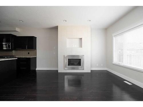 152 Collicott Drive, Fort Mcmurray, AB - Indoor Photo Showing Other Room With Fireplace