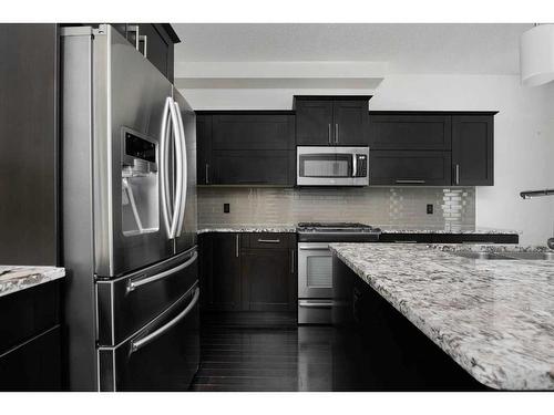 152 Collicott Drive, Fort Mcmurray, AB - Indoor Photo Showing Kitchen With Upgraded Kitchen