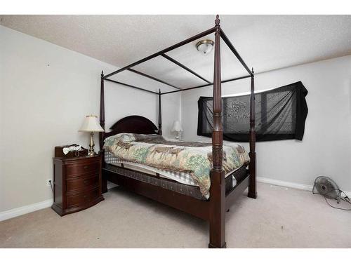 125 Ryan Lane, Fort Mcmurray, AB - Indoor Photo Showing Bedroom