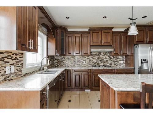 129 Sandhill Place, Fort Mcmurray, AB - Indoor Photo Showing Kitchen With Double Sink With Upgraded Kitchen