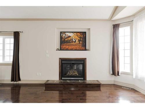 129 Sandhill Place, Fort Mcmurray, AB - Indoor Photo Showing Living Room With Fireplace