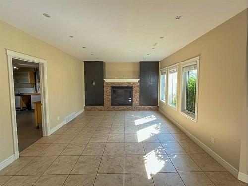 255 Wild Rose Street, Fort Mcmurray, AB - Indoor Photo Showing Other Room With Fireplace