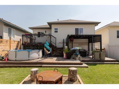 114 Bussieres Drive, Fort Mcmurray, AB - Outdoor With Above Ground Pool With Deck Patio Veranda With Exterior