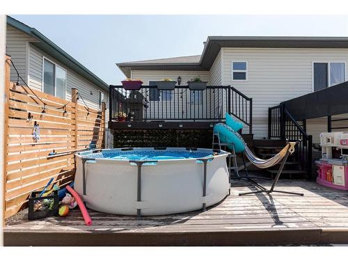 114 Bussieres Drive, Fort Mcmurray, AB - Outdoor With Above Ground Pool With Deck Patio Veranda With Exterior