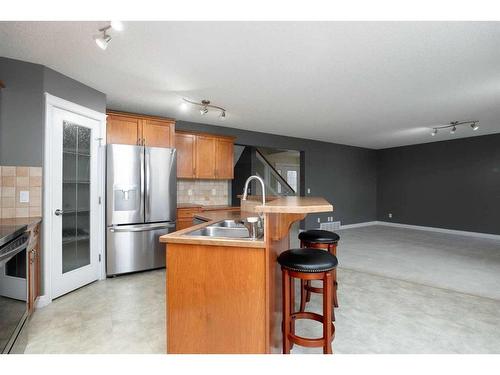 251 Laffont Way, Fort Mcmurray, AB - Indoor Photo Showing Kitchen With Stainless Steel Kitchen With Double Sink