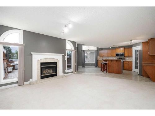 251 Laffont Way, Fort Mcmurray, AB - Indoor Photo Showing Living Room With Fireplace