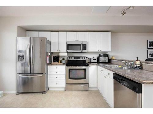 17-240 Laffont Way, Fort Mcmurray, AB - Indoor Photo Showing Kitchen With Double Sink